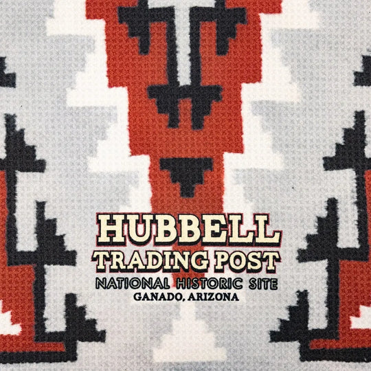 Patterned fabric with Hubbell Trading Post branding and location text.