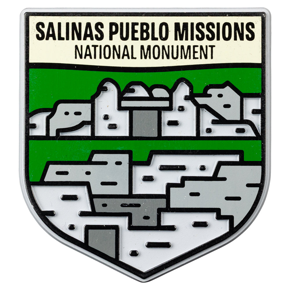 Logo of Salinas Pueblo Missions National Monument with green and gray design.