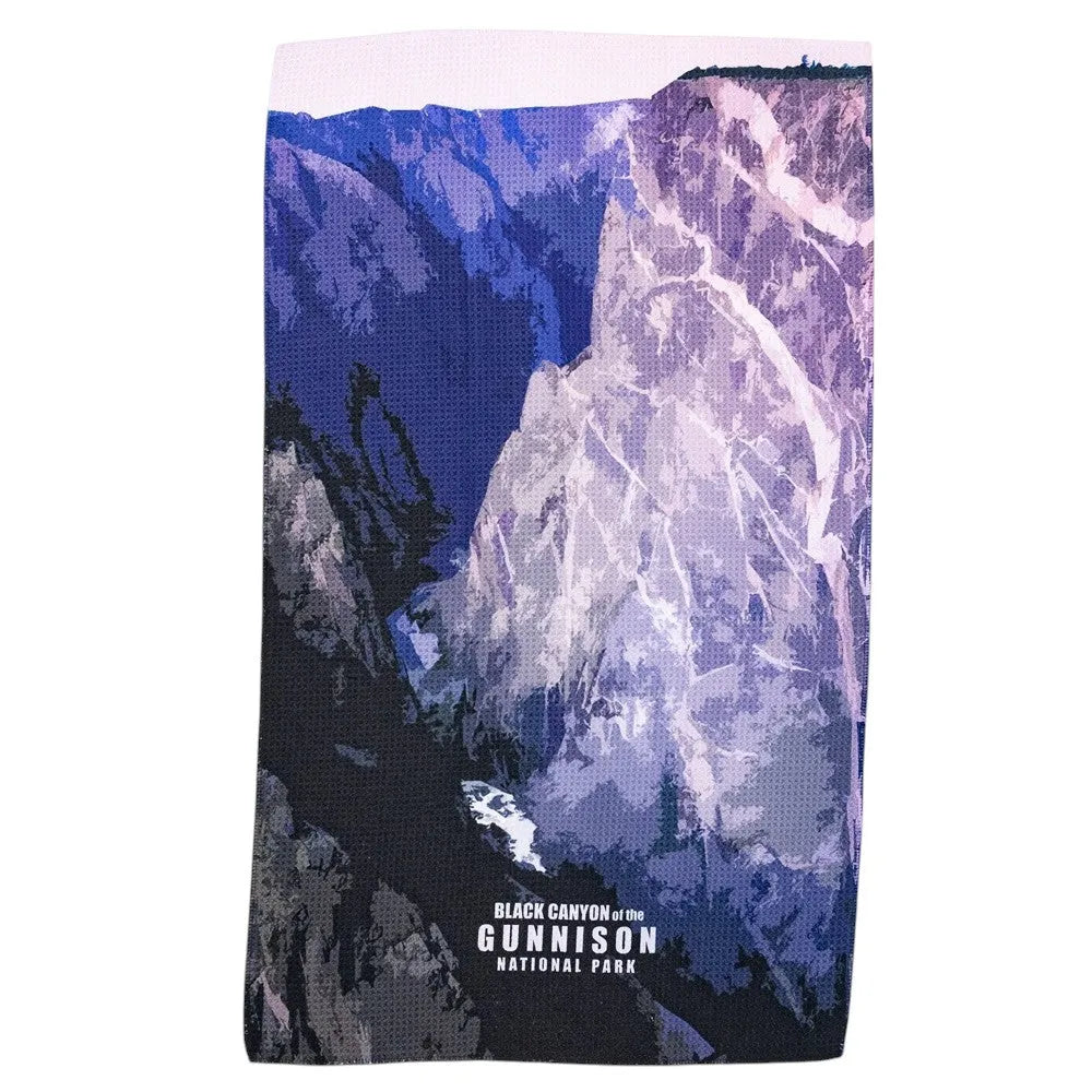 Kitchen towel with a mountain landscape design and 'Black Canyon of the Gunnison National Park' text on a white background