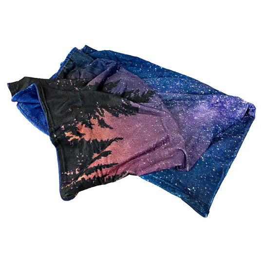 Casually tossed blanket with night sky design