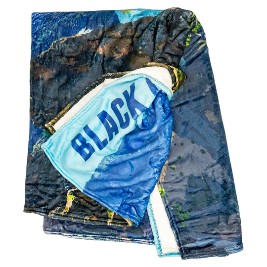 Black Canyon of the Gunnison National Park Fleece Blanket detail of folded blanket on white background