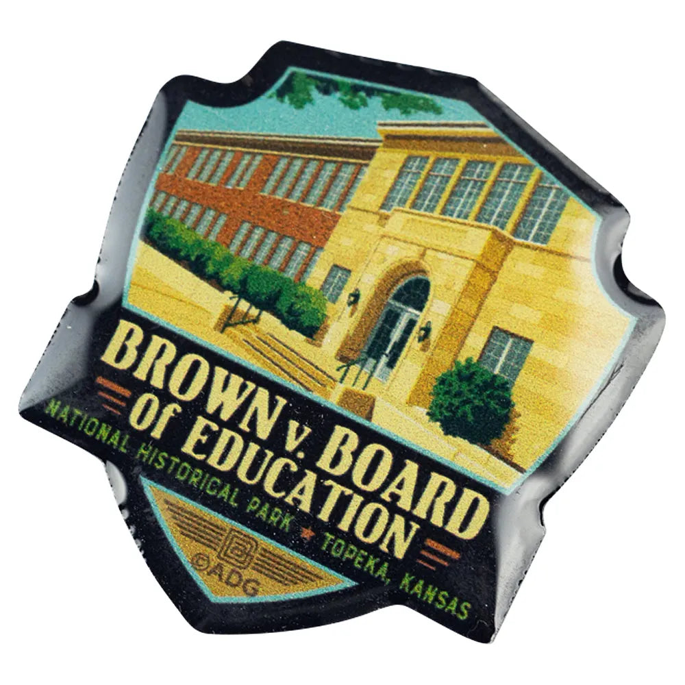Badge-shaped pin with 'Brown v. Board of Education' National Historical Park design on a white background