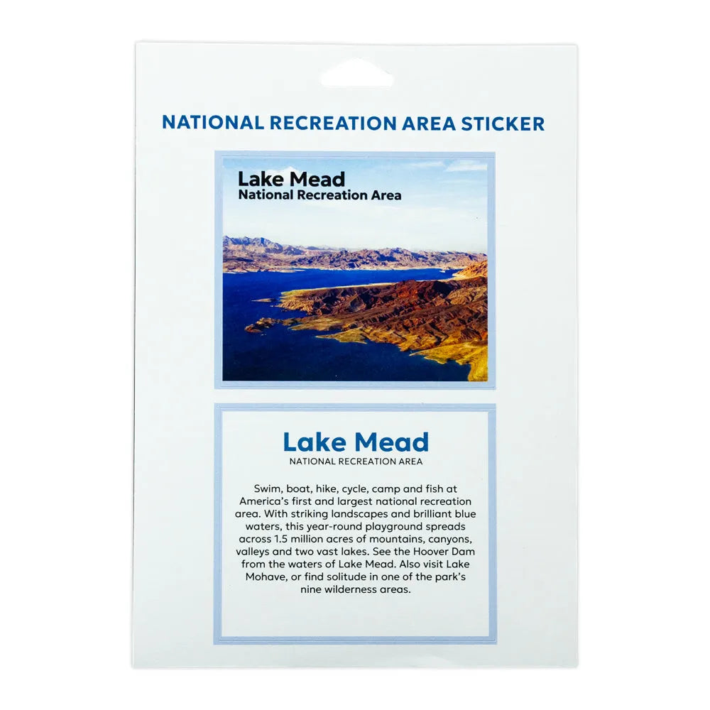 A National Recreation Area Sticker featuring Lake Mead National Recreation Area, with a scenic photograph of blue water and rocky shores, and descriptive text printed on a white card.