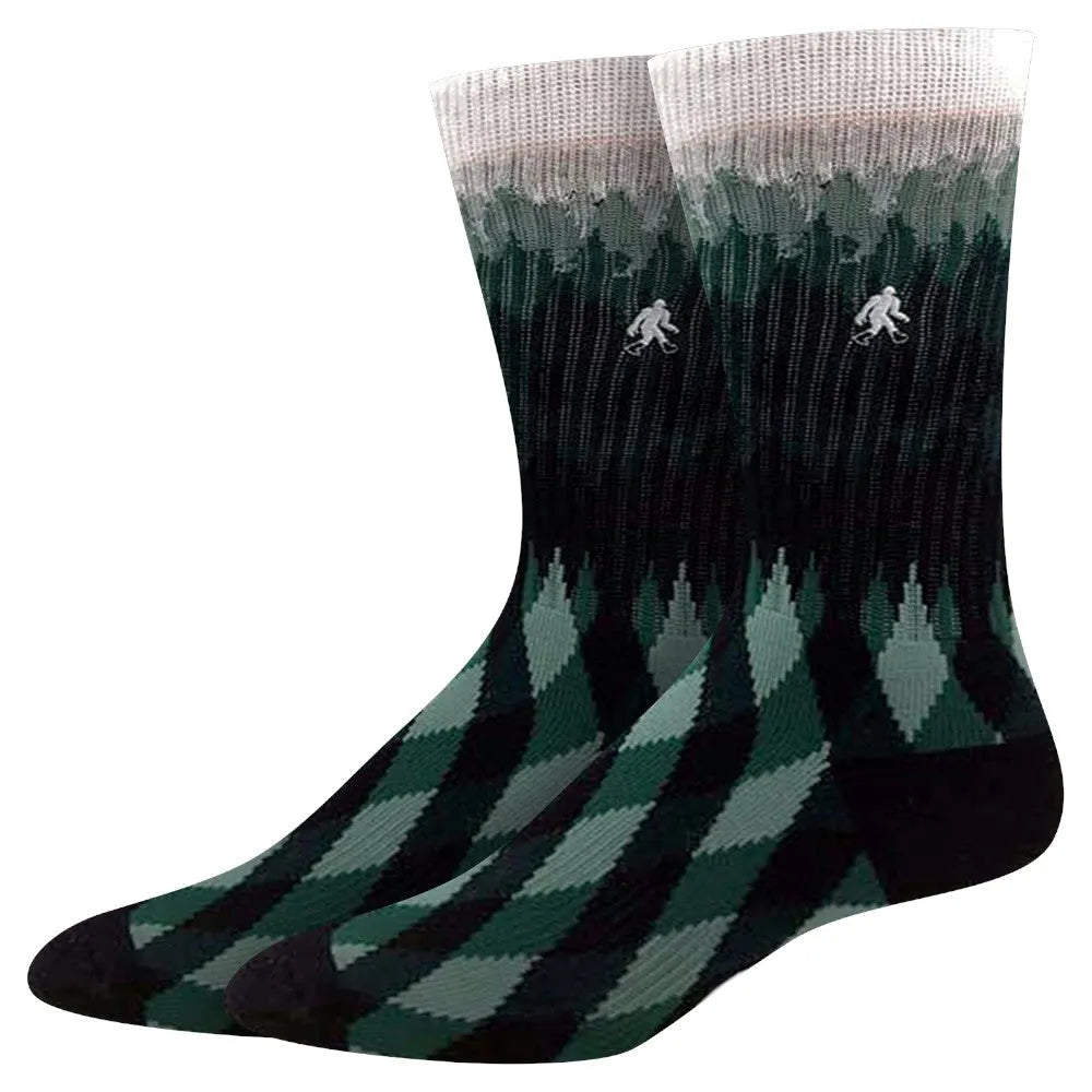Green and black Forest pattern knit socks on a white background