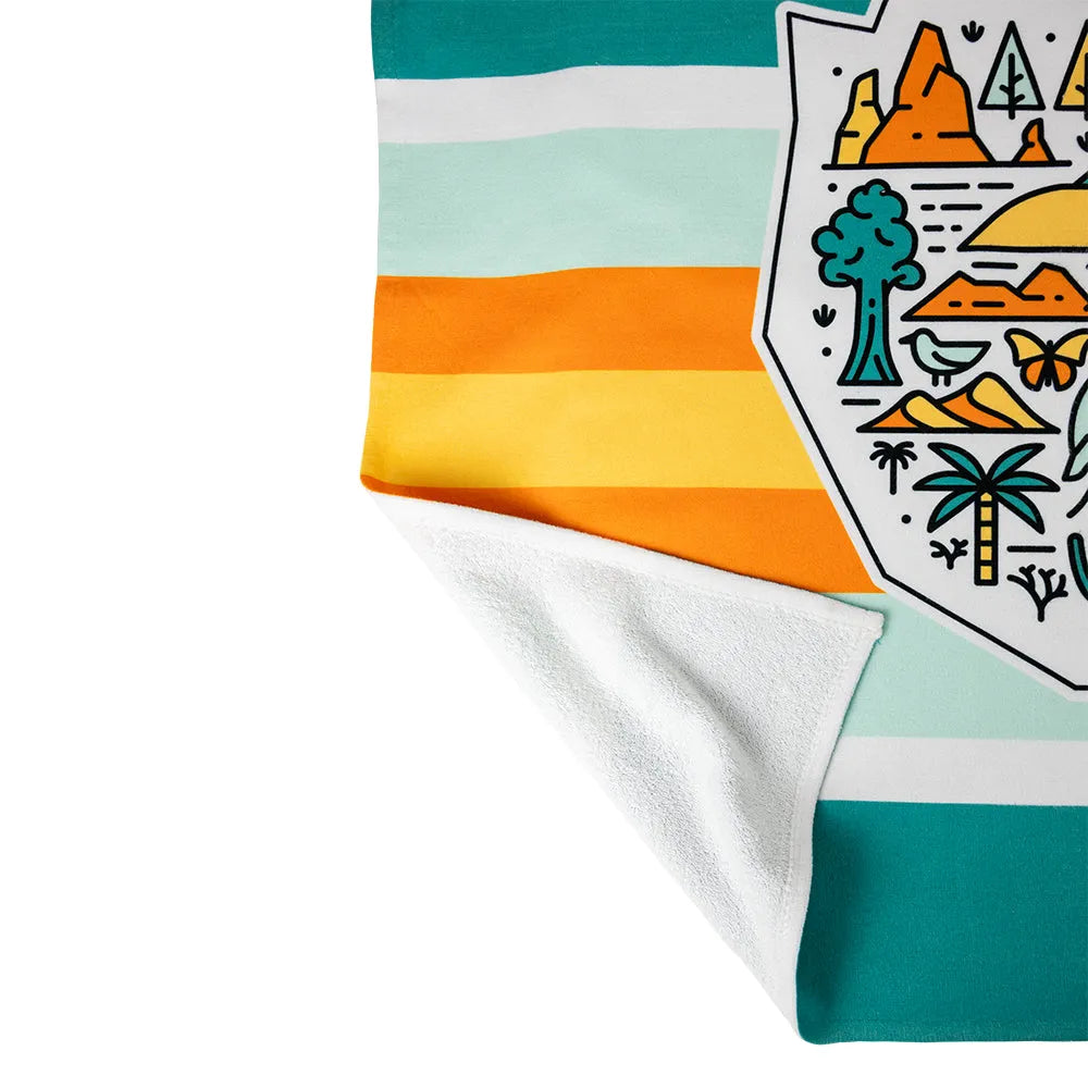Adventure Awaits National Park Beach Towel with corner folded up to reveal reverse side