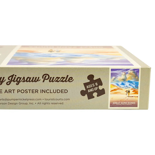 Jigsaw puzzle box with desert scene design and text on a white background