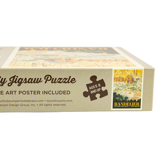 Box of a jigsaw puzzle with Bandelier National Monument design on a white background