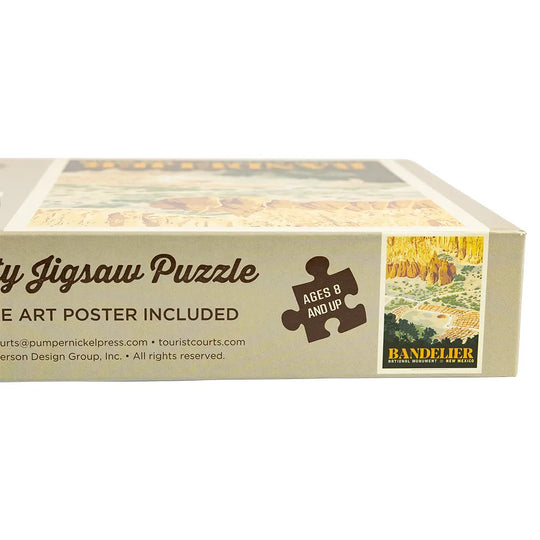 Box of a jigsaw puzzle with Bandelier National Monument design on a white background