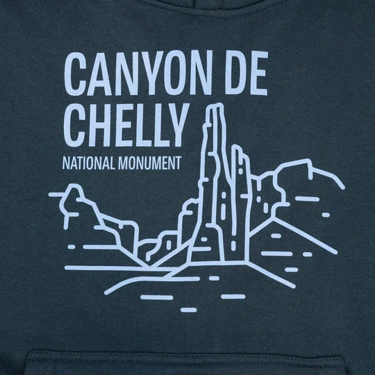 Navy blue sweatshirt with white 'Canyon de Chelly National Monument' design