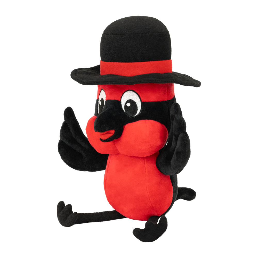 Red plush toy with a black hat on a white background