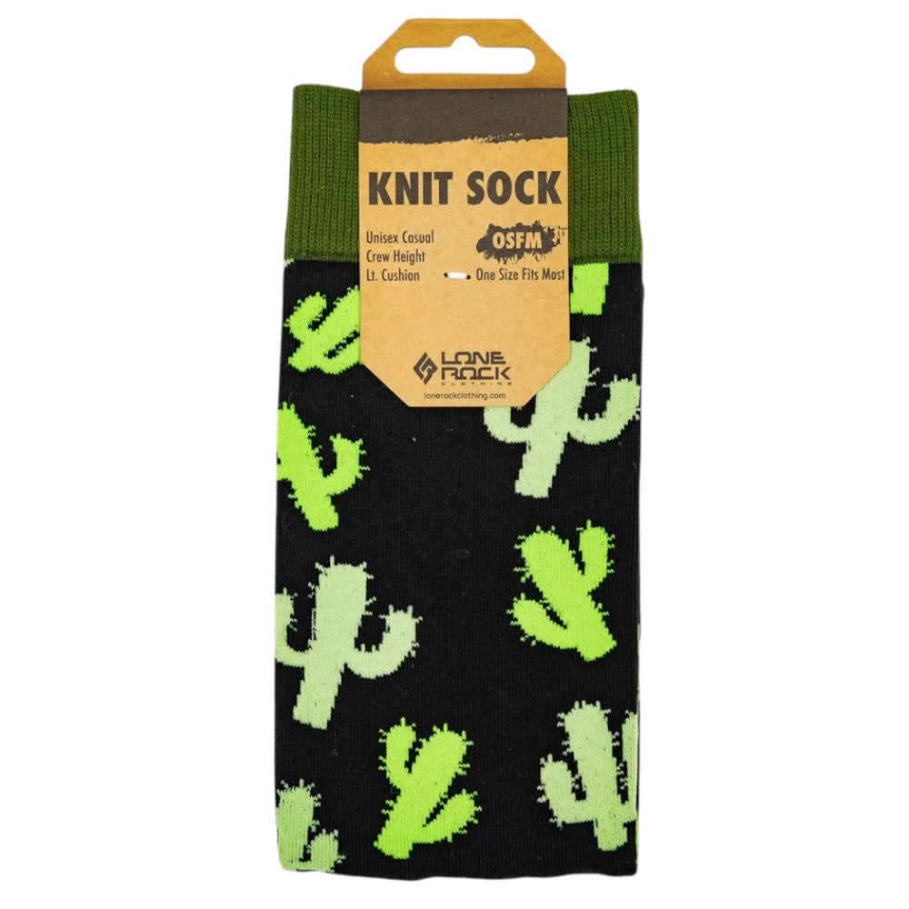 Knit sock with various shades of green saguaro cacti pattern against a black ground set against a white backdrop