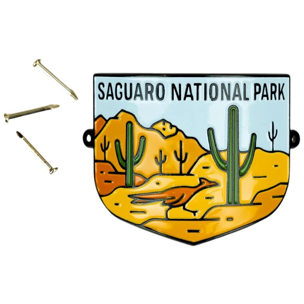 Saguaro National Park logo hiking stick medallion with desert landscape and cacti and installation nails.