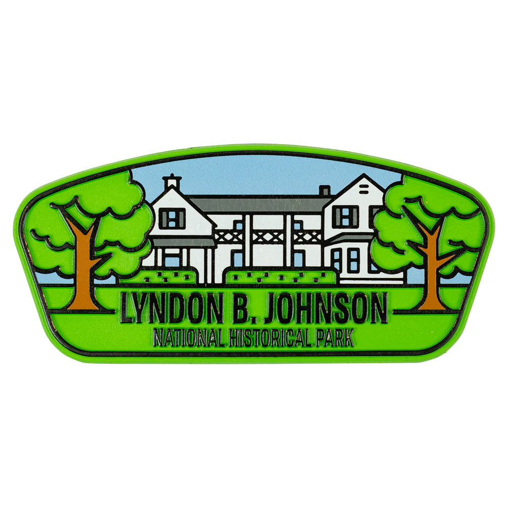 Magnet of Lyndon B. Johnson National Historical Park with a house and trees on a green background