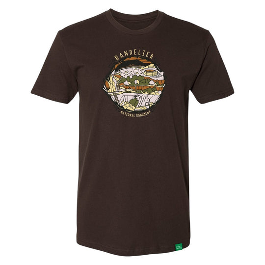 Brown t-shirt with a graphic design and text 'Bandelier National Monument' on a white background