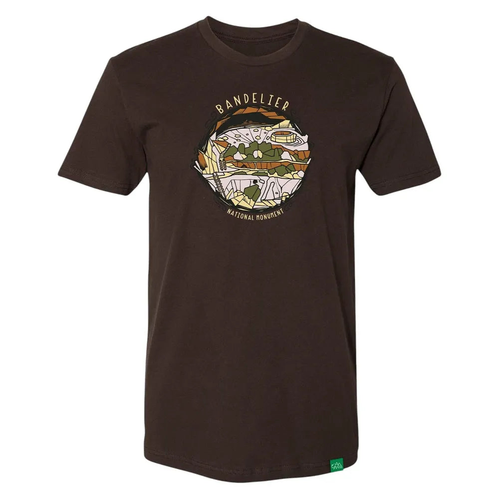 Brown t-shirt with a graphic design and text 'Bandelier National Monument' on a white background