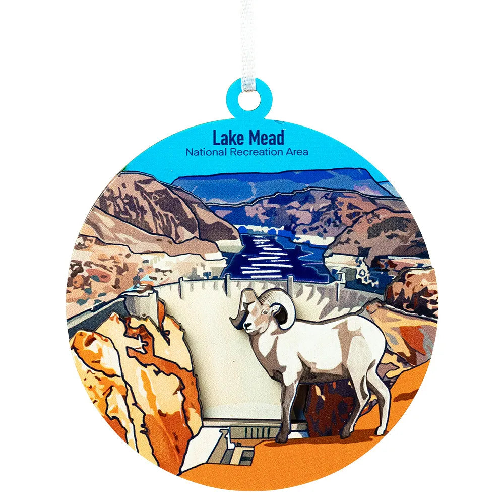 Circular ornament with Lake Mead National Recreation Area design featuring a mountain, lake, and desert landscape.