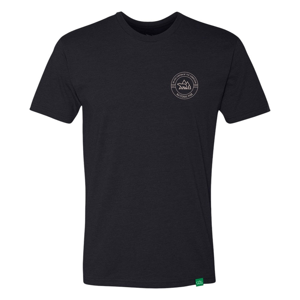 Black t-shirt with a bear logo on the chest surrounded by the text 'Black Canyon of the Gunnison National Park' against a white background