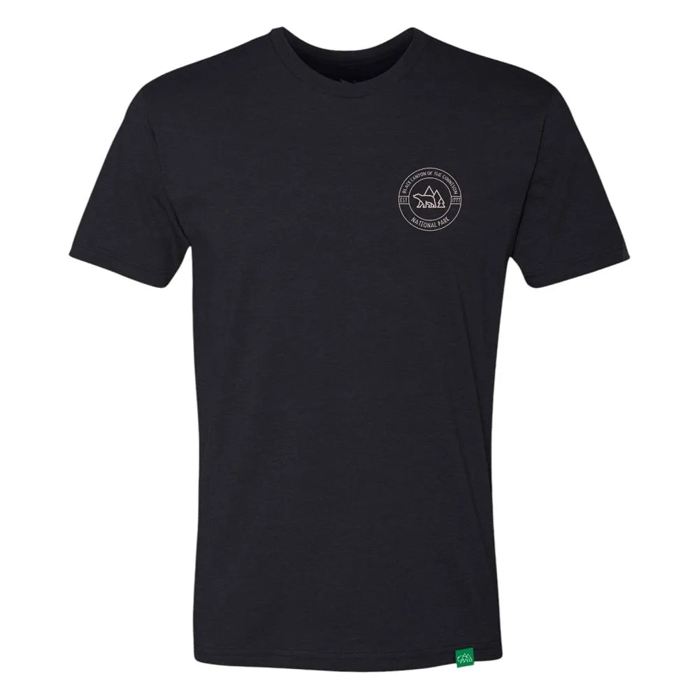 Black t-shirt with a bear logo on the chest surrounded by the text 'Black Canyon of the Gunnison National Park' against a white background