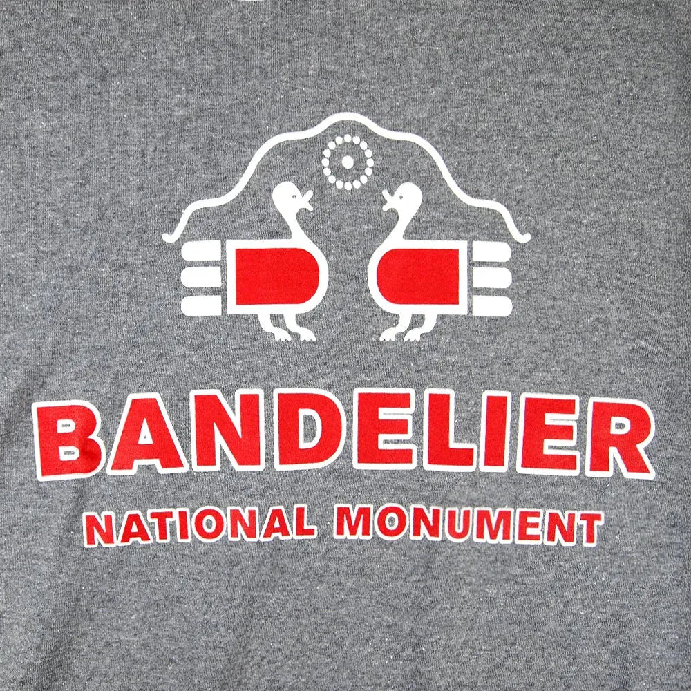 Gray t-shirt with Bandelier National Monument logo featuring two birds and red text on a gray background.
