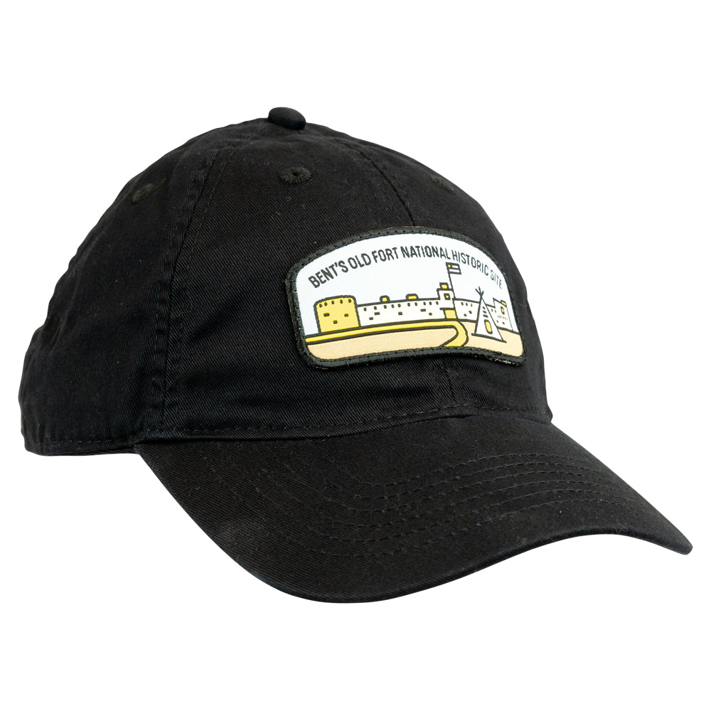 Black cap with a patch featuring a fort design with the text Bent's Old Fort National Historic Site on a white background