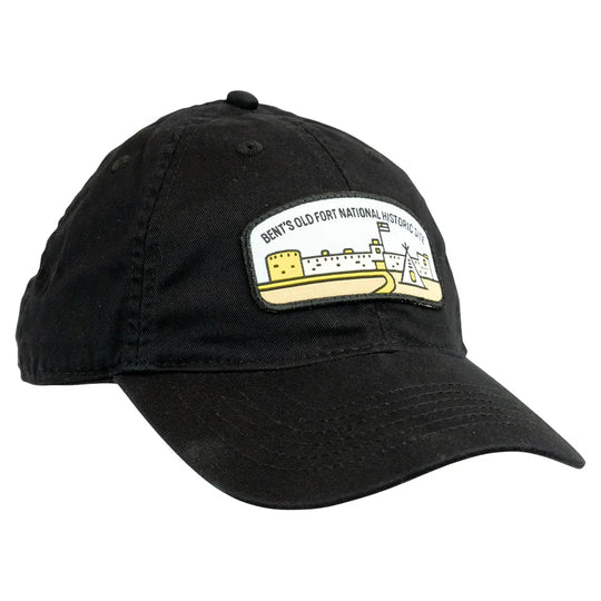 Black cap with a patch featuring a fort design with the text Bent's Old Fort National Historic Site on a white background
