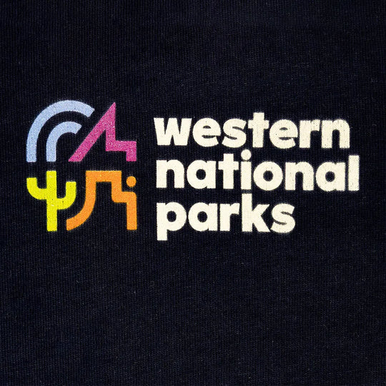Front logo detail for Western National Parks on a navy blue T-shirt