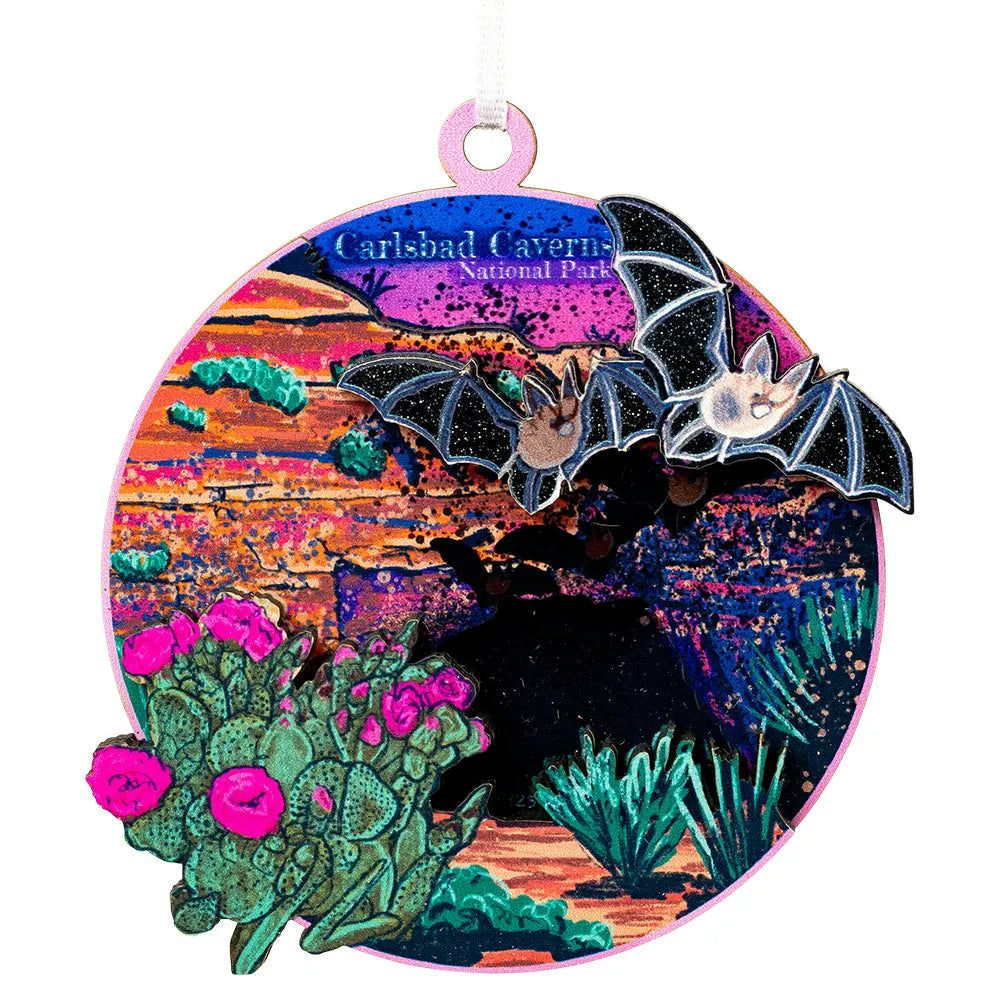 Decorative ornament with bats and cacti design, featuring Carlsbad Caverns National Park text.