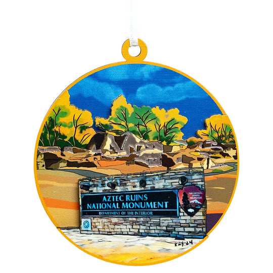 Decorative ornament with Aztec Ruins National Monument design on a white background