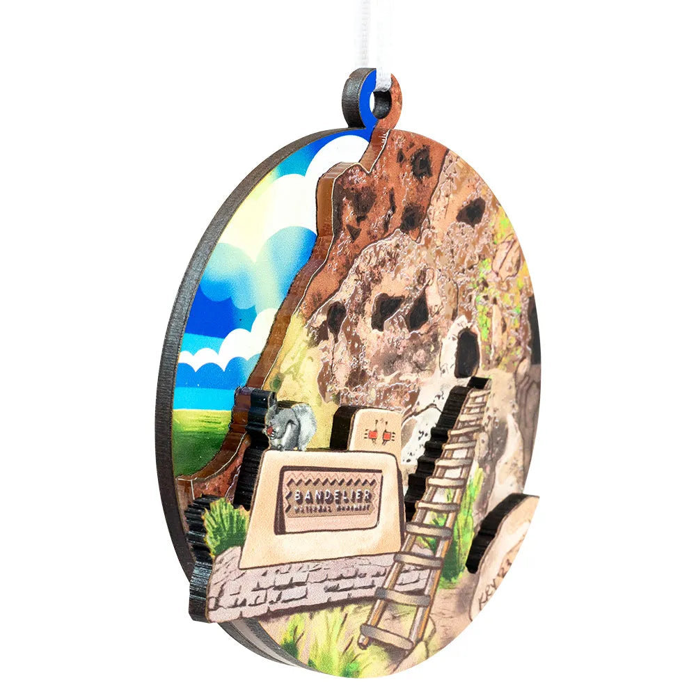 Decorative ornament for Bandelier National Monument with a scenic design on a white background