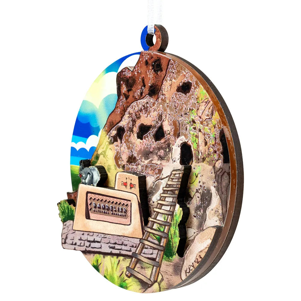 Decorative ornament for Bandelier National Monument with a scenic design on a white background