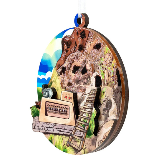 Decorative ornament for Bandelier National Monument with a scenic design on a white background