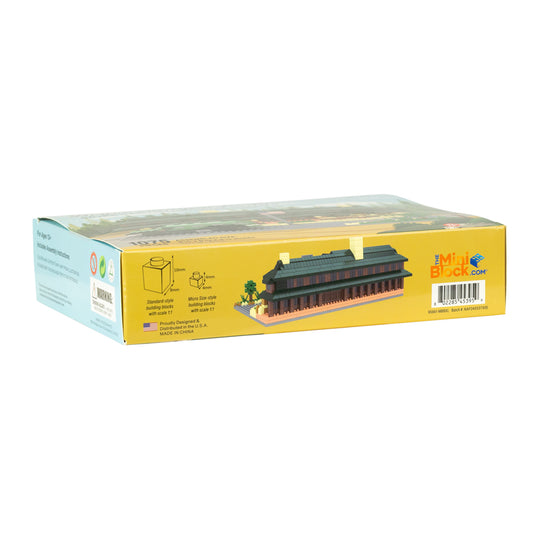 Yellow box with a model building on it, featuring the brand 'Mini Blocks'.