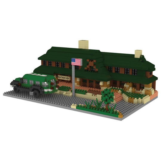 Min block set of the Lodge at Bryce Canyon National Park with a green roof and a flag, featuring a toy car in front on a white background.