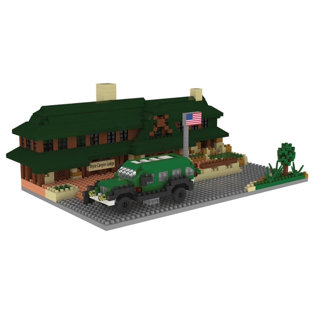 Min block set of the Lodge at Bryce Canyon National Park with a green roof and a flag, featuring a toy car in front on a white background.