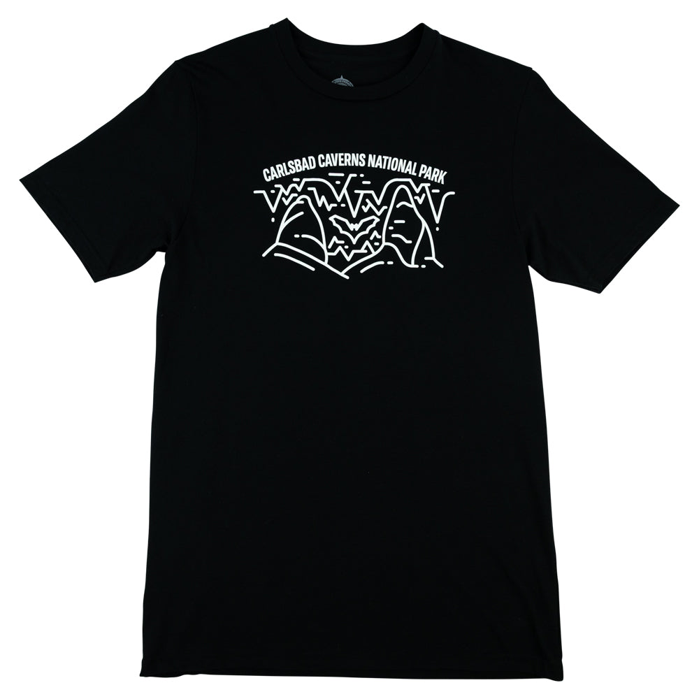 Carlsbad Caverns National Park logo with cave and bat design on a black t-shirt against a white background