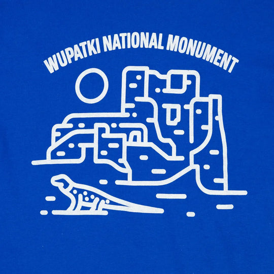 Detail of Fell logo for Wupatki National Monument on a blue T-shirt 