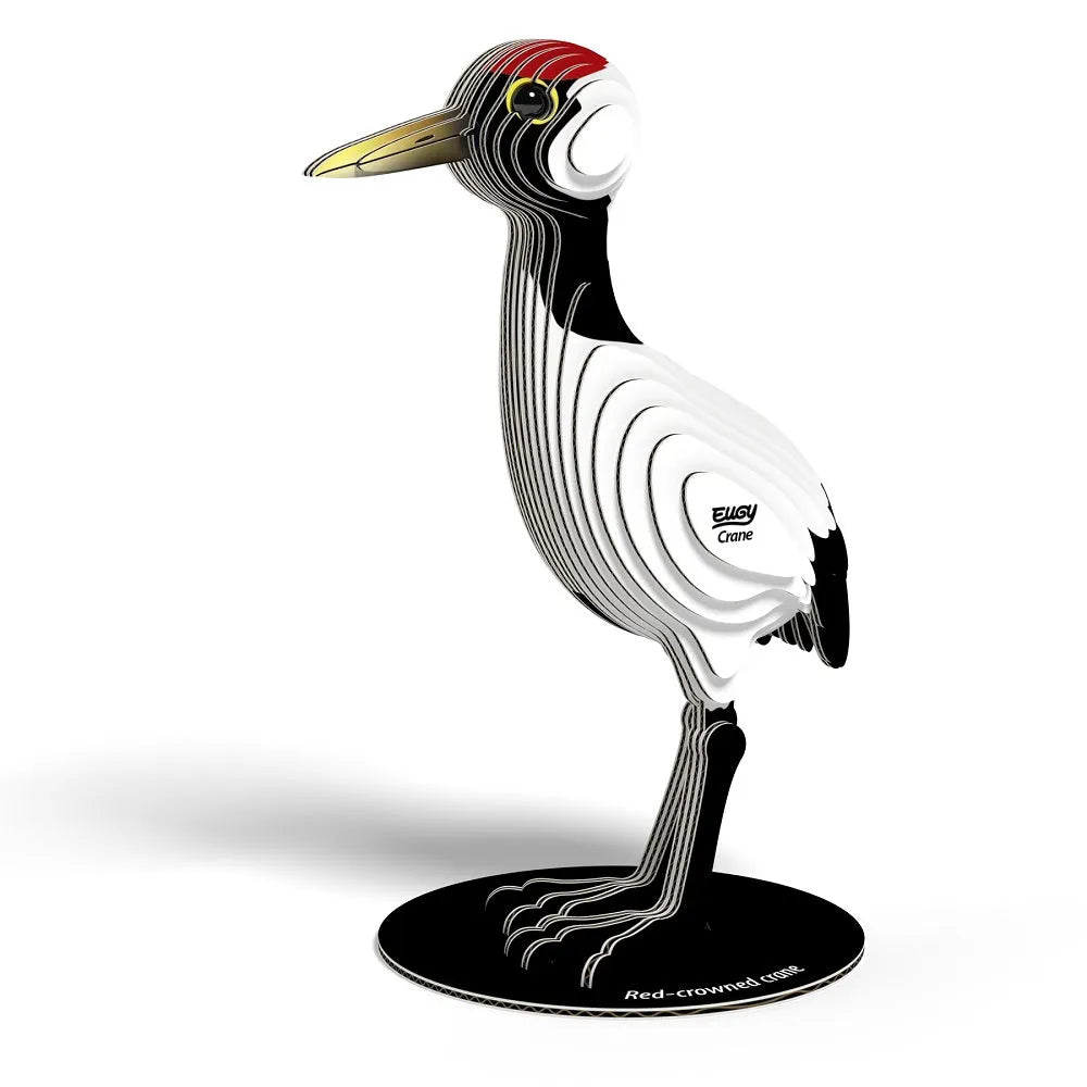 Decorative sculpture of a red-crowned crane on a white background