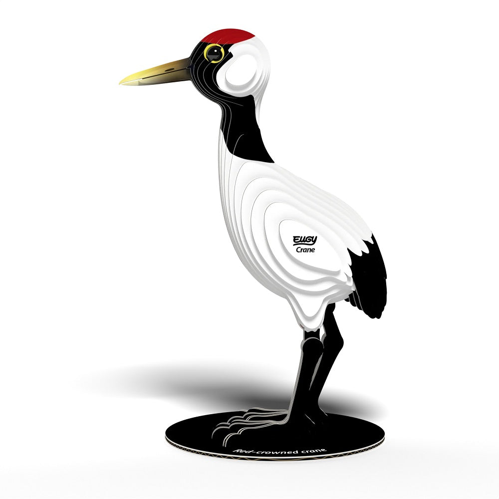Decorative crane figure with a red crest on a white background