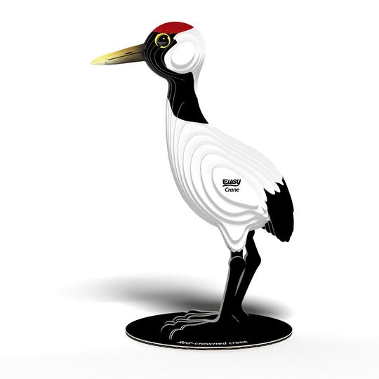 Decorative crane figure with a red crest on a white background