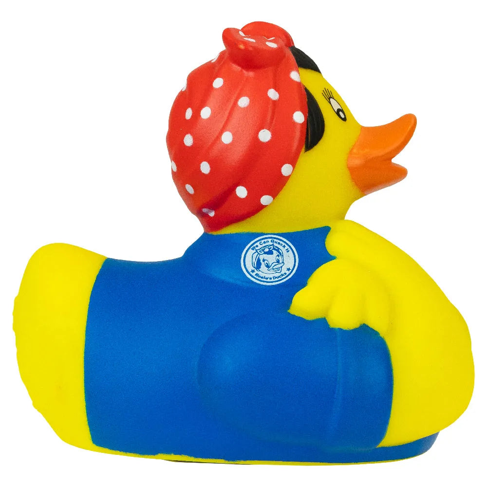 "Rosie the Riveter" rubber duck with a red polka dot headscarf and blue outfit on a white background