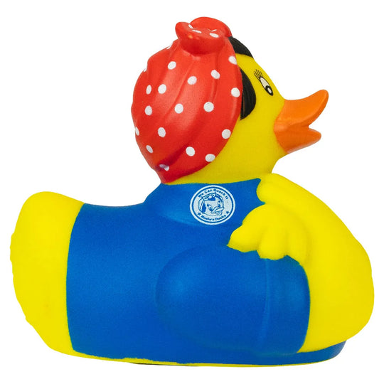 "Rosie the Riveter" rubber duck with a red polka dot headscarf and blue outfit on a white background
