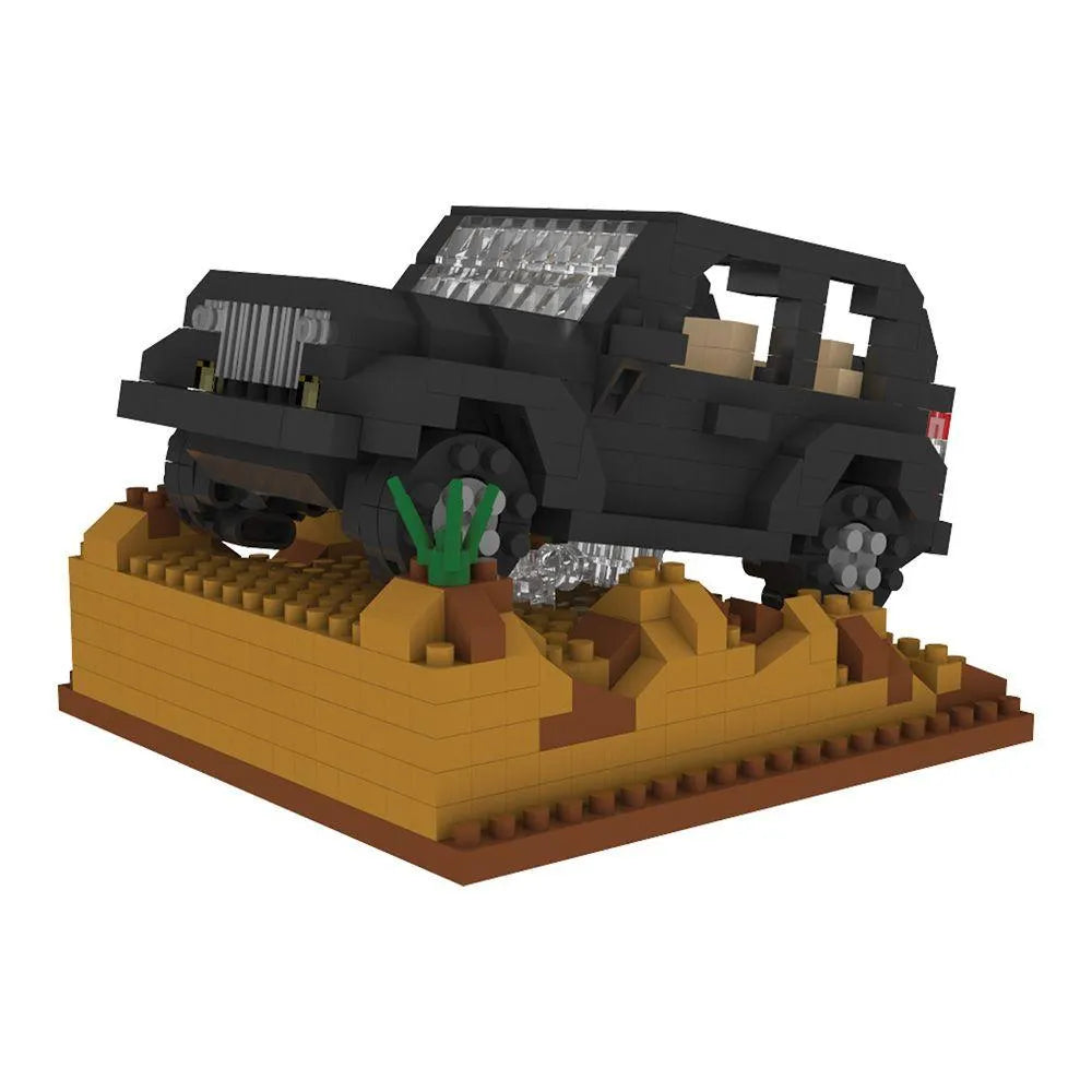 Box of mini building blocks off-road vehicle set with desert landscape design.