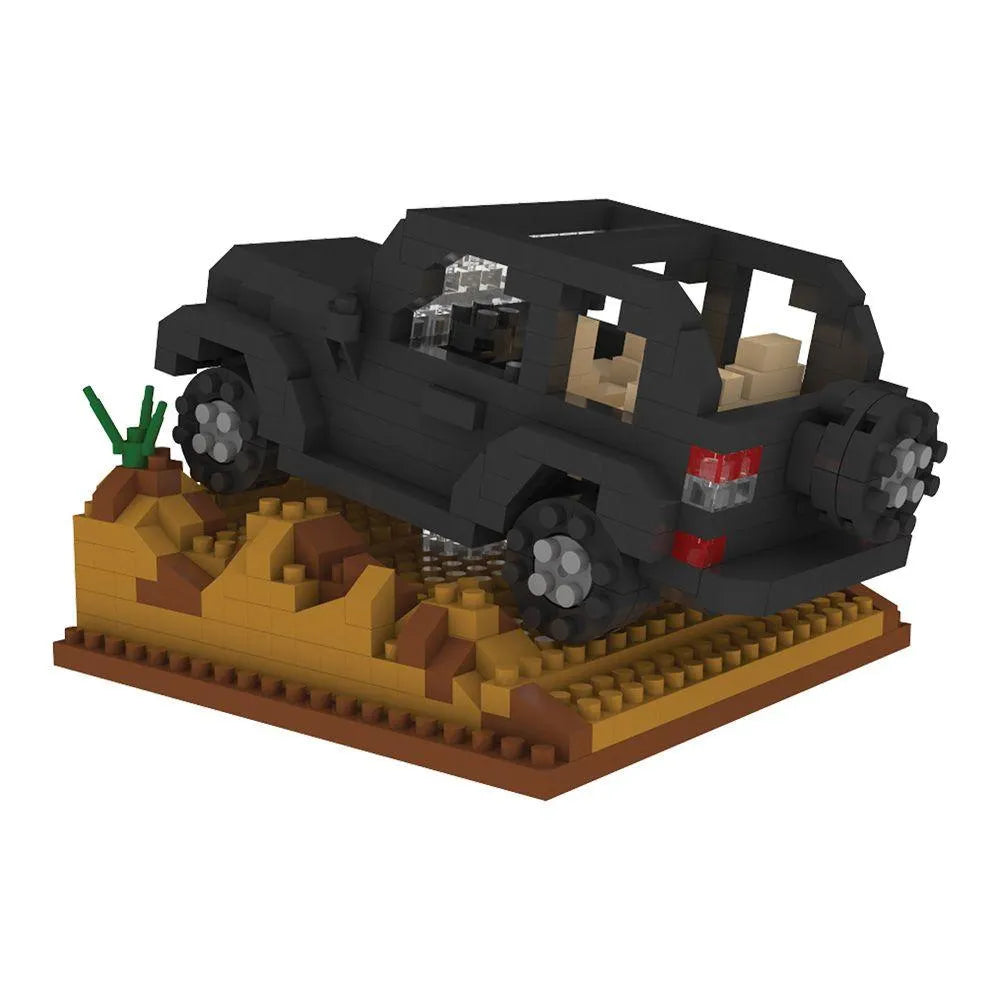 Box of mini building blocks off-road vehicle set with desert landscape design.