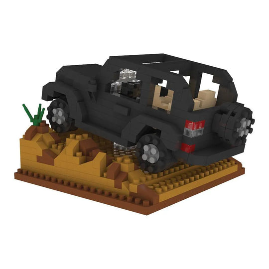Box of mini building blocks off-road vehicle set with desert landscape design.