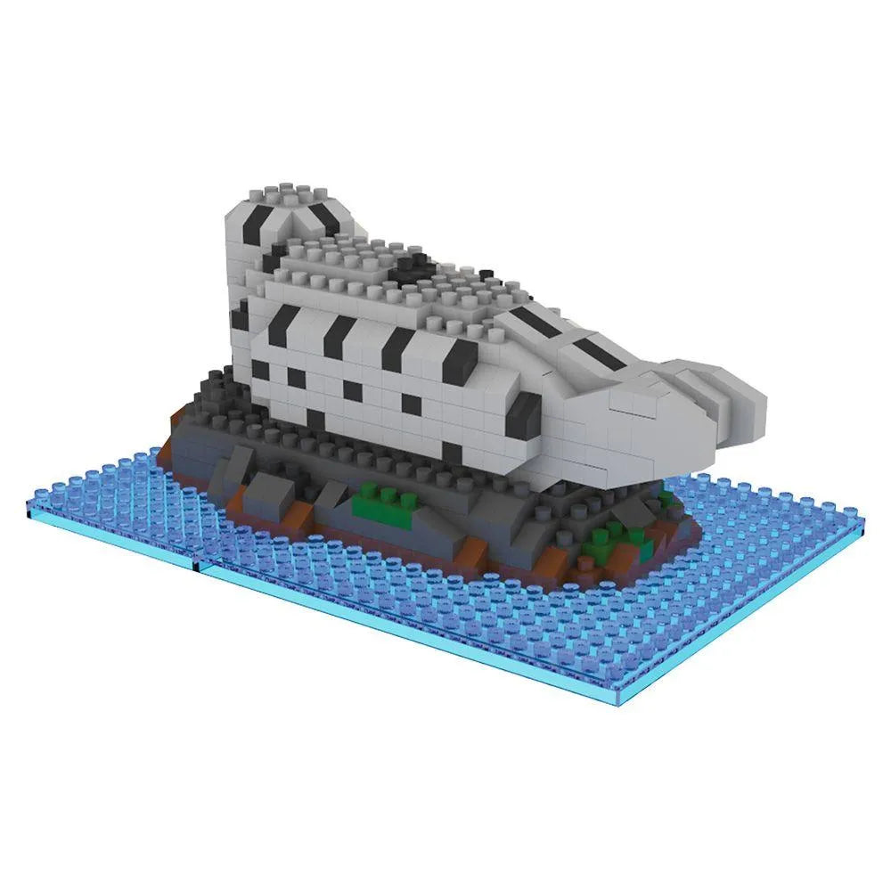 Mini building block set shaped like a harbor seal on a blue baseplate with a white background.