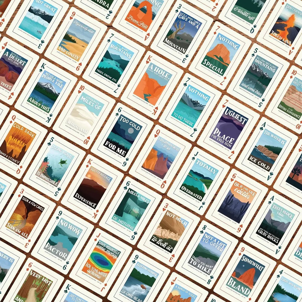 Pattern of playing cards with scenic illustrations on a brown background