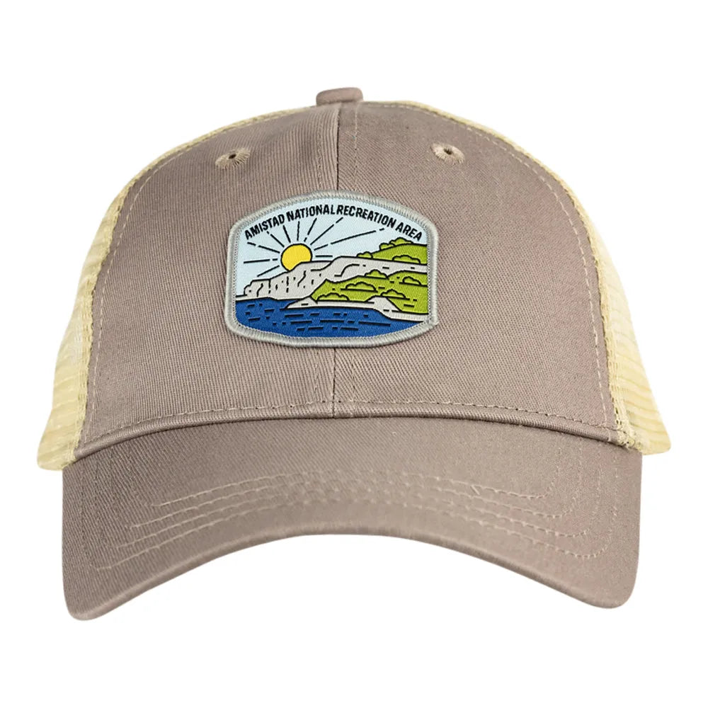 Light gray cap with colorful patch representing Amistad National Recreation Area on a white background