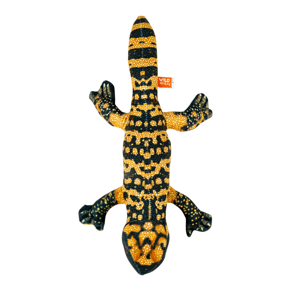 A plush toy lizard covered in black and yellow patterns, shown on a plain white background.