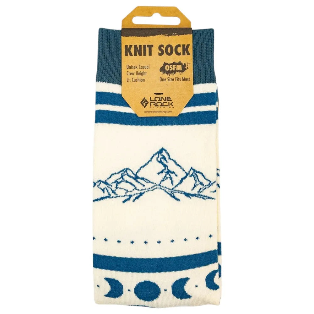 Knit sock with mountain and moon design and packaging on a white background