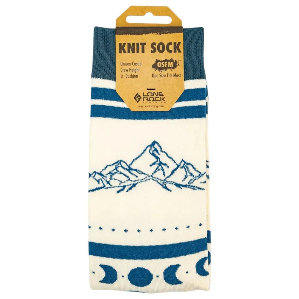 Knit sock with mountain and moon design and packaging on a white background